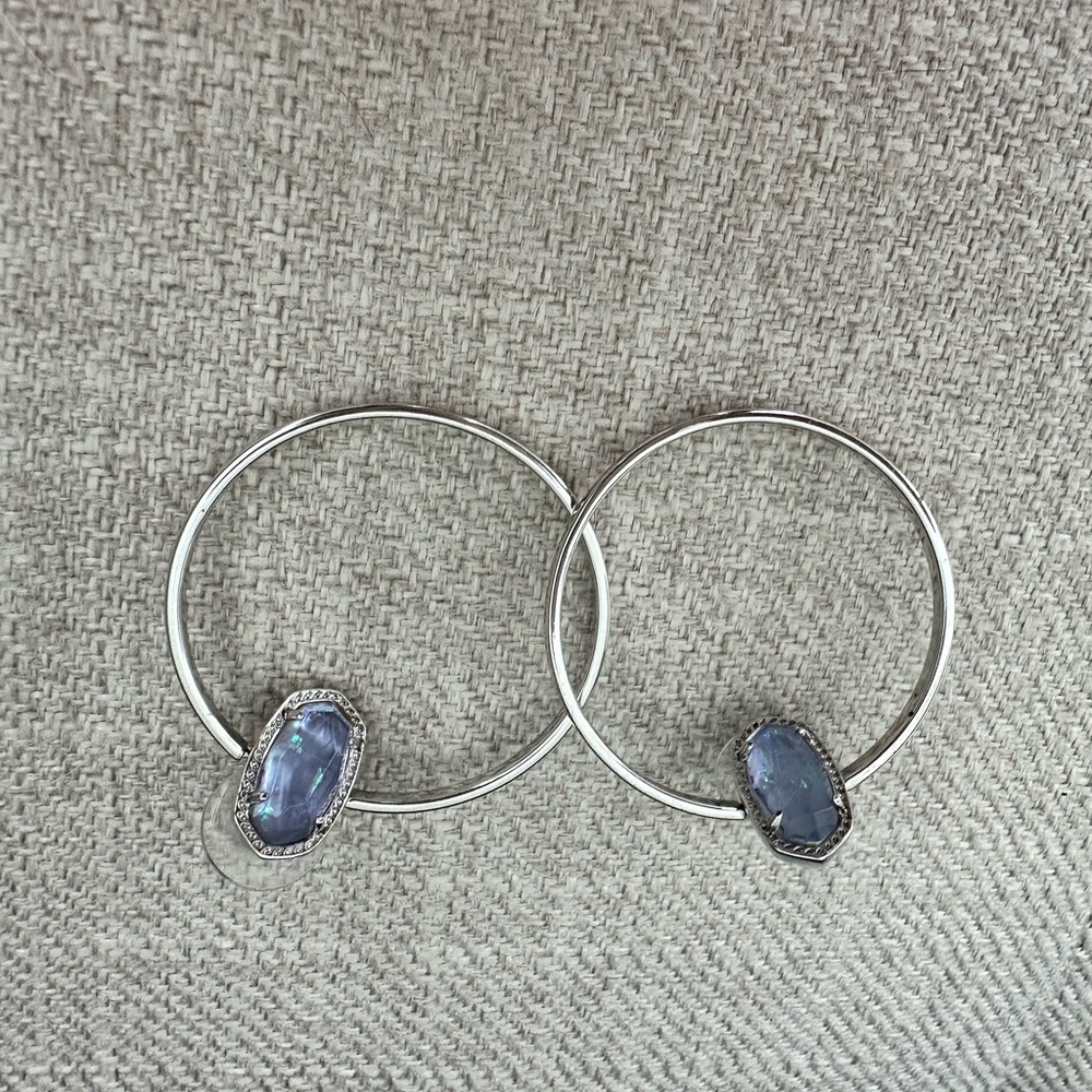 Elegant Silver Hoop Earrings with Blue Gemstone